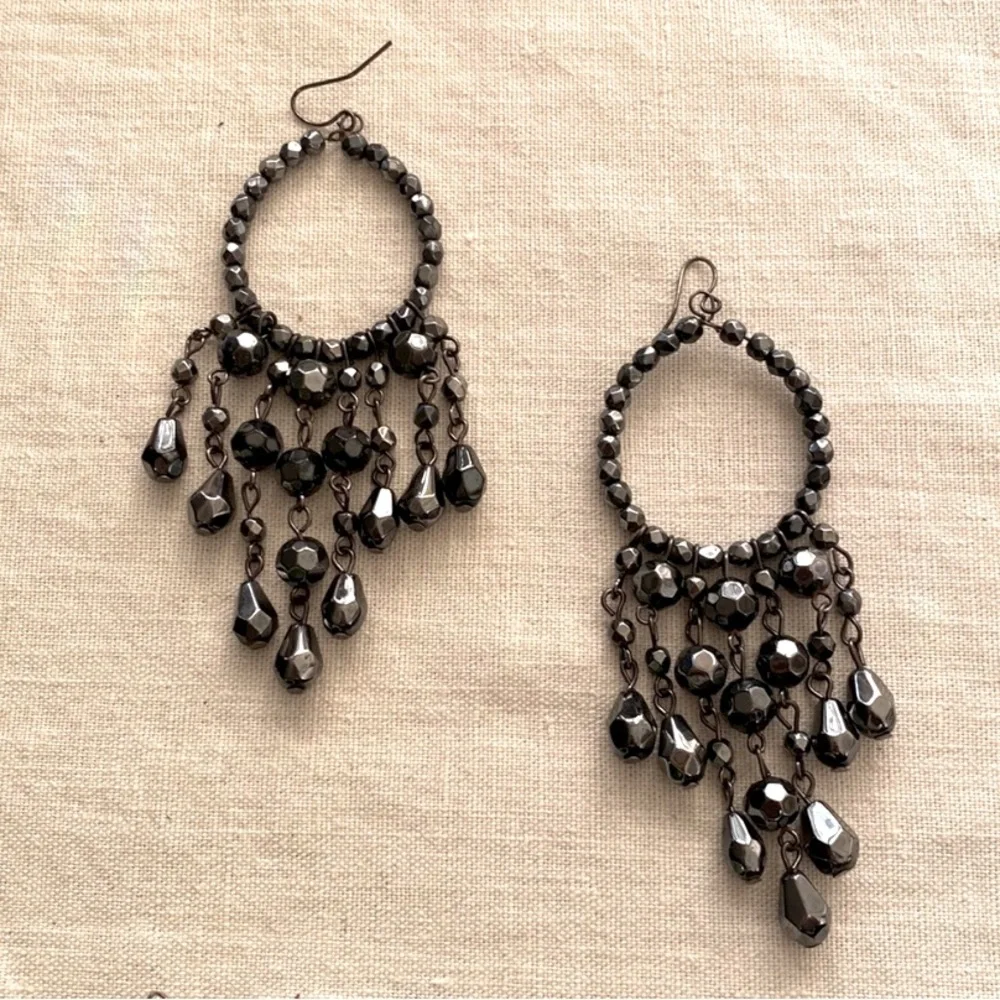 Lightweight large shiny gray beaded dangling chandelier earrings.